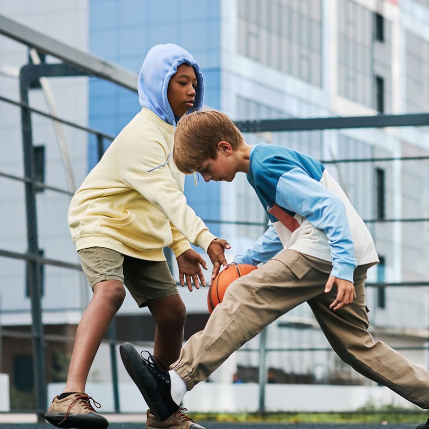 Young basketball players during a game